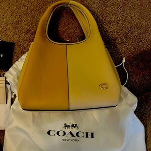Brand new in the box Coach purse and card holder